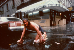 Thumbnail photograph from performance piece The Red Broadway Crawler