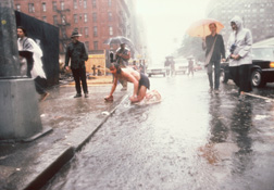 Thumbnail photograph from performance piece The Red Broadway Crawler